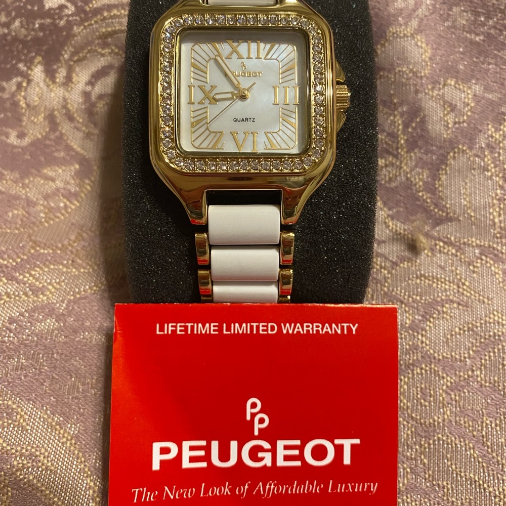 Peugeot Gold and White Timepiece